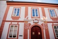 House At The White Lamb  Narrow picturesque street with baroque and renaissance historical buildings in winter sunny day in Royalty Free Stock Photo