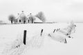 House in a white winter landscape