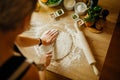 House wife making quick easy homemade crunchy crust dough from scratch by hand. Gluten free.Gluten intolerance.Low carb substitute