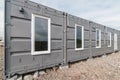 House with windows and doors made of iron containers for cargo transportation Royalty Free Stock Photo