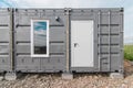 House with windows and doors made of iron containers for cargo transportation Royalty Free Stock Photo