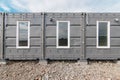House with windows and doors made of iron containers for cargo transportation Royalty Free Stock Photo