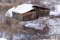 House in winter. Charred beams of a wooden house. Burned down house