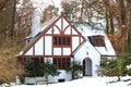 House in Winter Forest