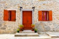 House with wooden windows and door,