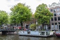 Houseboat along of a canal in Amsterdam, Netherlands