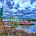 Houseboat amd Bridge ober the rhine River Royalty Free Stock Photo