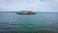 A houseboat in a lake at the Kerala Backwaters in India. Houseboat on Kerala backwaters Ashtamudi Lake Royalty Free Stock Photo