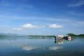 Houseboat, lake, moutain and sky in Thailand Royalty Free Stock Photo