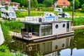 Houseboat for rent in the harbor for use as a vacation home waiting for vacationers