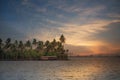 A houseboat on the Vembanad lake, kumarakom, kerala, backwaters at sunset Gods own country