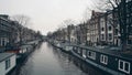 Typical houseboats along city canal embakments in Amsterdam, Netherlands