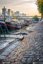 Houseboats on a paved bank of the river Seine, Paris France Royalty Free Stock Photo