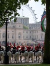 Household cavalry at the Trooping the Colour ceremony. The London Eye can be seen in the background.