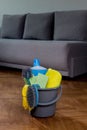 Household cleaners, detergent, rag, rubber gloves, washcloth, brush, cleaning bucket. Means for keeping the house clean Royalty Free Stock Photo