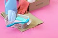 Household cleaning products in open boxes on a bright background