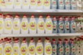 Household cleaning products on shelves in a supermarket. Big choice. Blurred Royalty Free Stock Photo