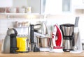 Household and kitchen appliances on table indoors Royalty Free Stock Photo