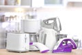 Household and kitchen appliances on table indoors Royalty Free Stock Photo