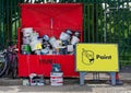 Linwood, UK, July 23rd 2023, Household plastics, cans and glass recycling containers and sign