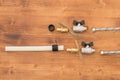 Household plumbing equipment on wooden background