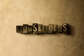 HOUSEHOLDS - close-up of grungy vintage typeset word on metal backdrop