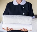 Housekeeper cleaning a hotel room Royalty Free Stock Photo