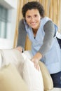 Housekeeper cleaning hotel room Royalty Free Stock Photo