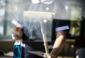 Housekeeper cleaning a hotel room