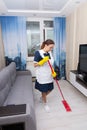 Housekeeper cleaning a hotel suite