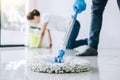 Housekeeping and cleaning concept, Young couple in blue rubber g Royalty Free Stock Photo