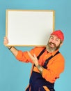 Housekeeping company. Mechanic perform technical work. Repairman worker. Man worker hold chalkboard copy space