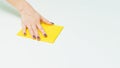 Housekeeping and household chores. Spring cleaning. hand with wet wipe cleaning table. Close up Royalty Free Stock Photo