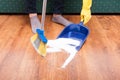 Housekeeping lady cleaning the mess from the floom Royalty Free Stock Photo