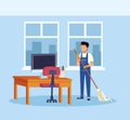 Housekeeping male worker with mop cleaning office