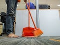 A Housekeeping Sweeping The Carpet Office Floor