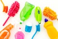 Housekeeping tool. Detergents, soap, cleaners and brush for housecleaner work on wooden background top view space for