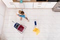 Housemaid Mopping Floor In Kitchen Royalty Free Stock Photo