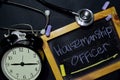 Housemanship Officer handwriting on chalkboard on top view Royalty Free Stock Photo