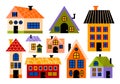 Colorful various small and tiny houses of different shapes, sizes and angles in cartoon comic style. Royalty Free Stock Photo