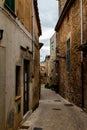 Houses along a narrow street in Valldemossa, Mallorca side view. Spain