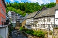 Houses along the Rur River in the historic center of Monschau, Germany