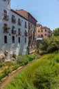 Houses alongside river Darro in Granada, Spain Royalty Free Stock Photo