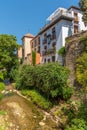 Houses alongside river Darro in Granada, Spain Royalty Free Stock Photo