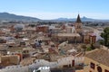 Houses around the Church of Santa Maria with the mountains in the background. Villena, Alicante, Spain Royalty Free Stock Photo