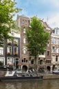 Houses and Boats on Amsterdam Canal Royalty Free Stock Photo