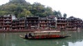 Houses and boats within FengHuang (Phoenix Ancient Town)