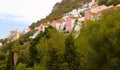 Houses build into the cliffs of the mountain in Gibraltar, UK