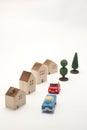 Houses, cars, and trees on white background. Royalty Free Stock Photo