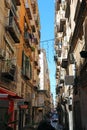 houses close to each other in the narrow alley of the Neapolitan neighborhood called the Spanish quarters